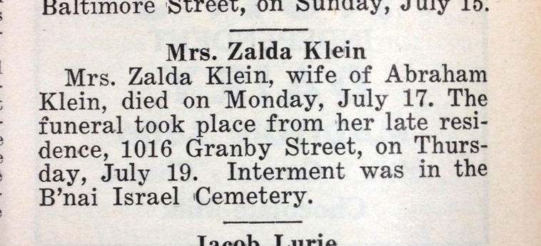 blurry obituary from newspaper